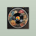 Floral vinyl record matte art print, 30 x 30 cm, hung on a sage green wall